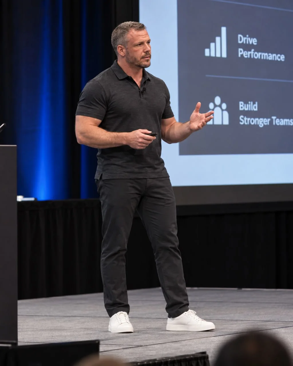 Ben Parker giving a keynote on a conference stage